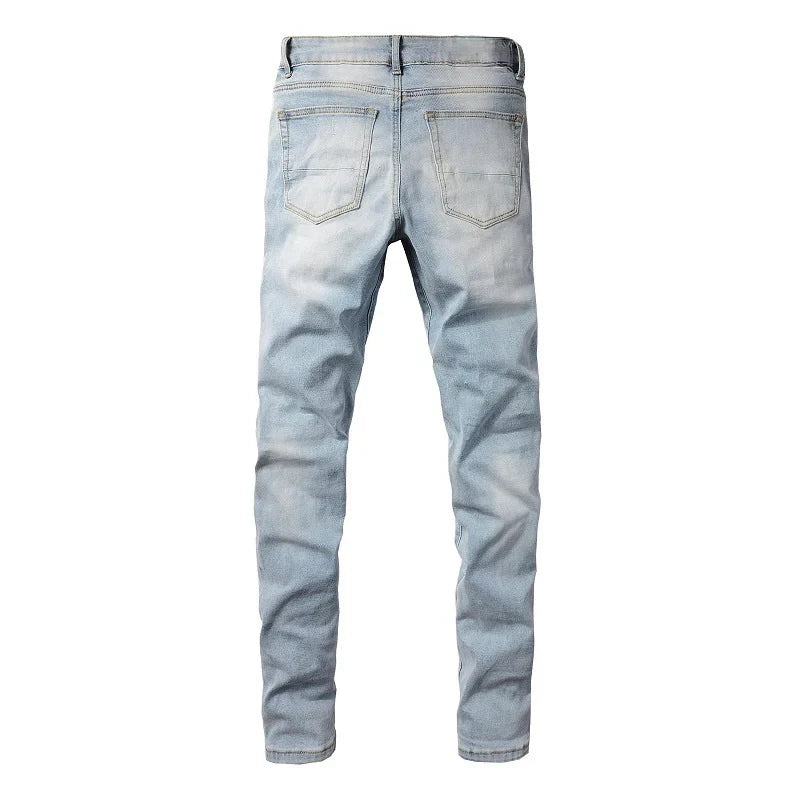 LIGHT LEATHER PATCH JEANS