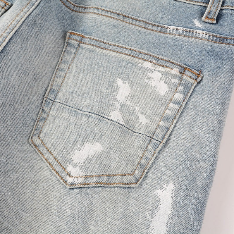 STAINED JEANS