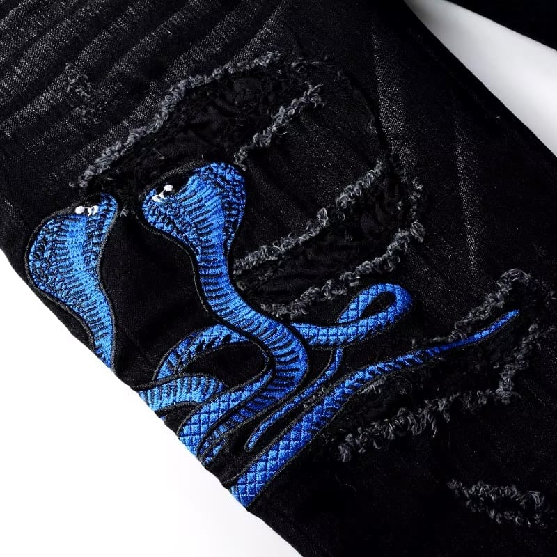 BLUE SNAKE JEANS