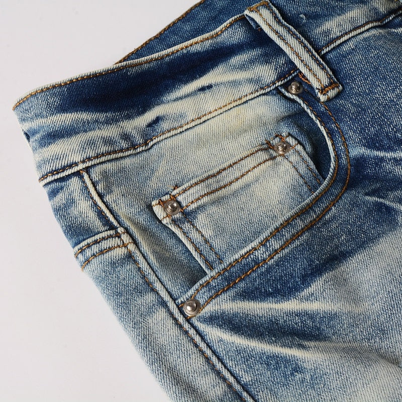 LEATHER PATCH JEANS