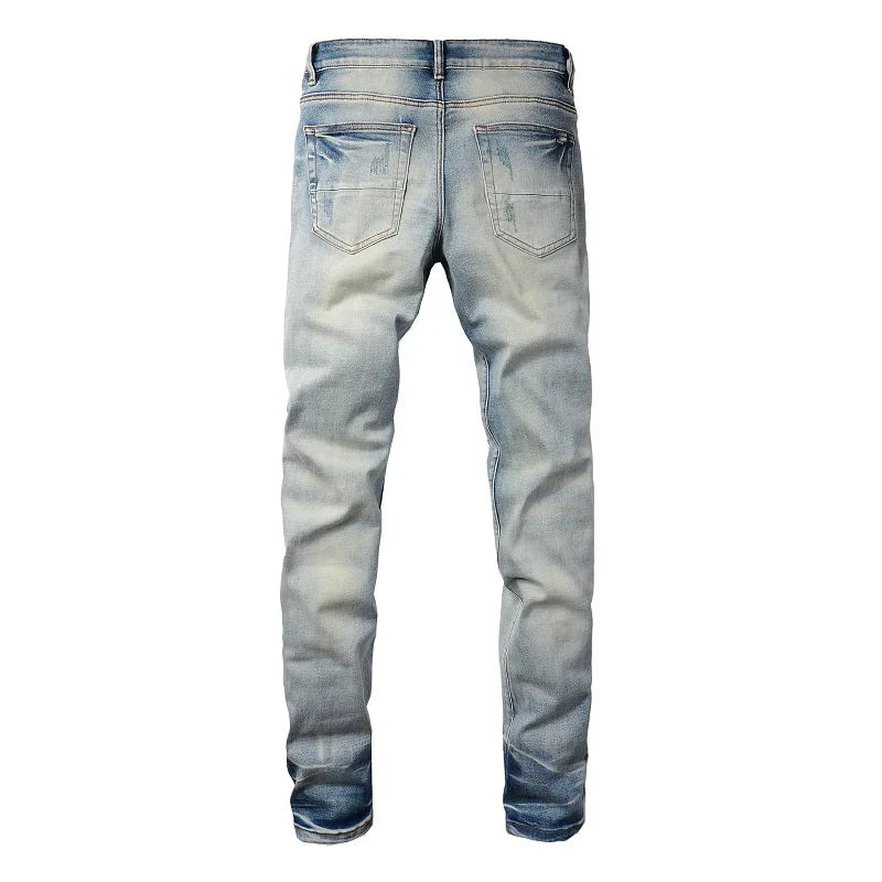 LEATHER PATCH JEANS